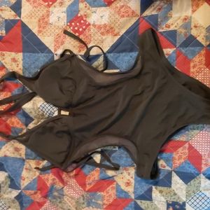 One piece bikini with mesh sides.